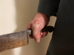 Pair Of Hands With Knife